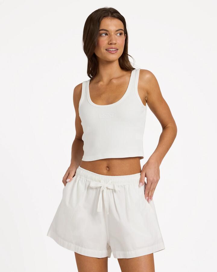 Image of a model wearing Tops. Product name - Roxy Womens All You Need Tank Top White in White colour by brand - Roxy