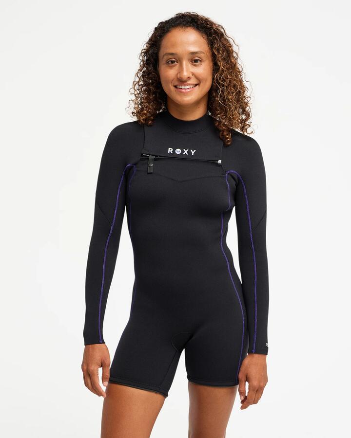 Image of a model wearing Tops. Product name - Roxy Womens 2Mm Elite Xtra Stretch Fullzip Long Sleeve Springsuit Dahlia in Dahlia colour by brand - Roxy