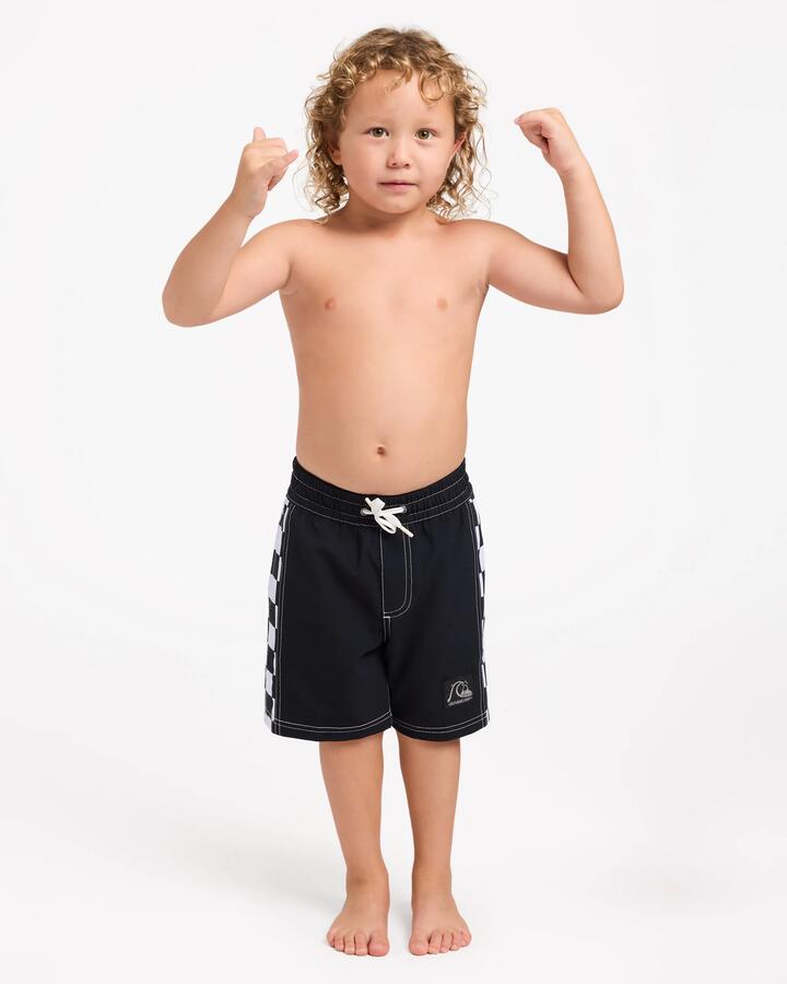 Image of a model wearing Shorts. Product name - Quiksilver Boys 2-7 Original Arch 13" Volley Shorts Black in Black colour by brand - Quiksilver