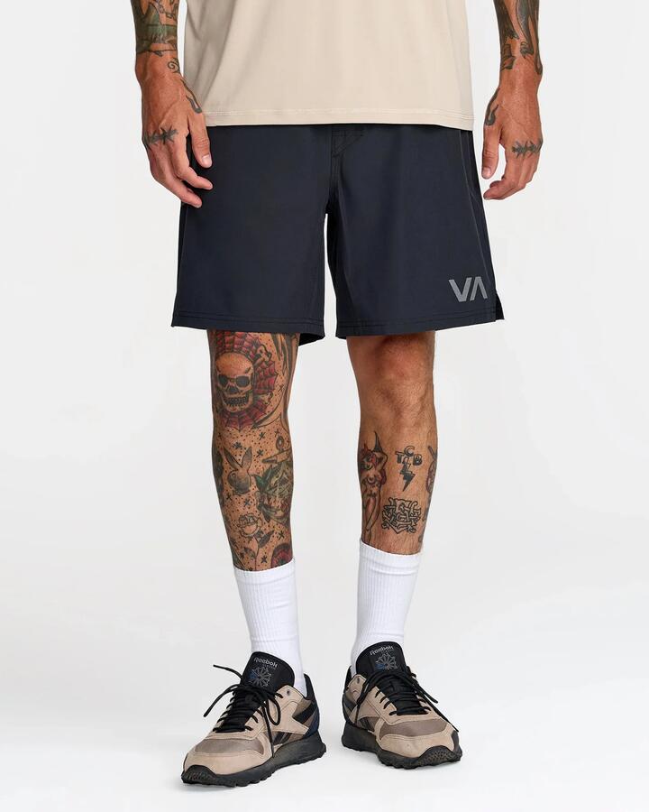 Image of a model wearing Shorts. Product name - Rvca Mens Scrapper Ii Walkshorts Black in Black colour by brand - Rvca