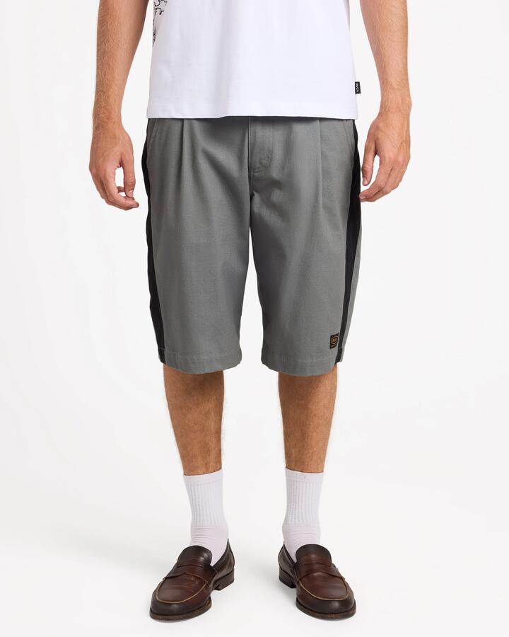 Image of a model wearing Shorts. Product name - Rvca Mens Dayshift Panel 22" Shorts Smoke in Smoke colour by brand - Rvca