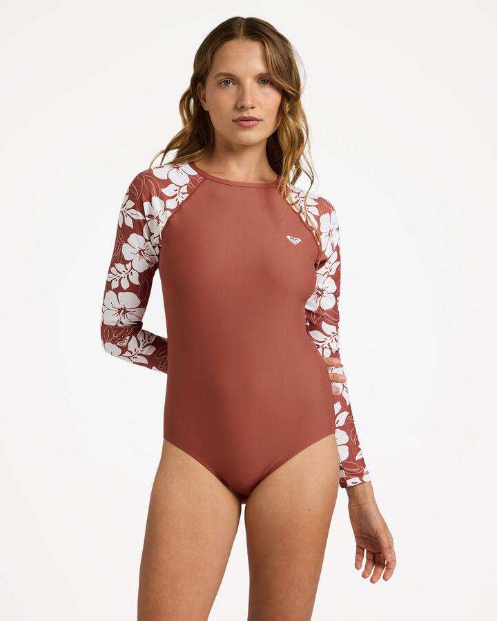 Image of a model wearing Tops. Product name - Roxy Womens Basic Mix Long Sleeve One Piece Swimsuit Chutney The New Mo S in Chutney The New Mo S colour by brand - Roxy
