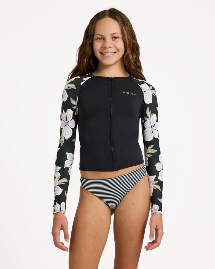 Image of a model wearing Tops. Product name - Roxy Girls 8-16 Of The Pacifc Long Sleeve Rashguard Anthracite Of The Pacific S in Anthracite Of The Pacific S colour by brand - Roxy