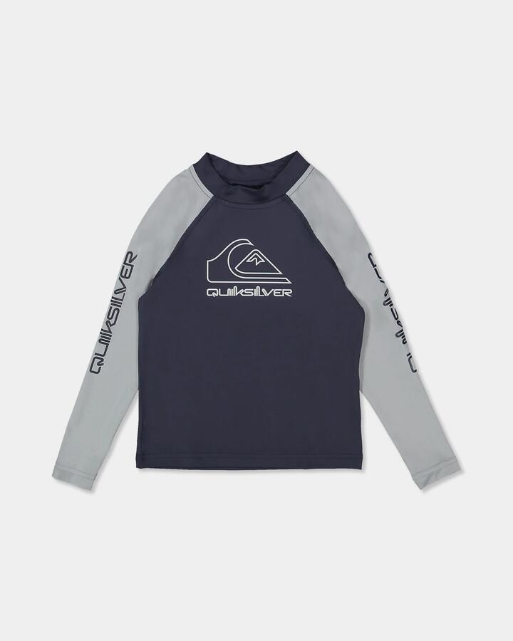 Image of a model wearing Tops. Product name - Quiksilver Boys 2-7 On Tour Long Sleeve Rash Vest India Ink in India Ink colour by brand - Quiksilver