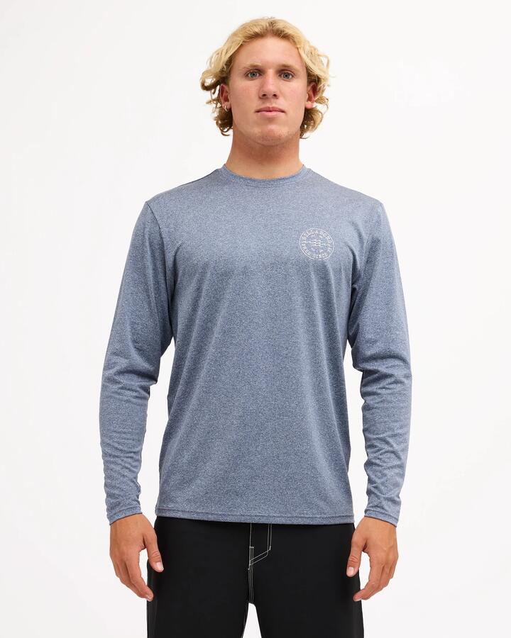 Image of a model wearing Tops. Product name - Billabong Mens Big Wave Daz Loose Fit Long Sleeve Rashguard Navy Heather in Navy Heather colour by brand - Billabong