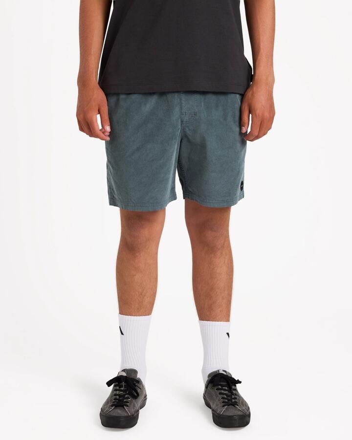 Image of a model wearing Shorts. Product name - Rvca Mens Escape Elastic Cord 17" Elastic Waist Shorts Balsam Green in Balsam Green colour by brand - Rvca
