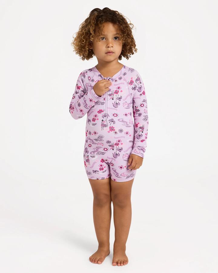 Image of a model wearing Tops. Product name - Billabong Girls 0-5 Hula Haze Long Sleeve Rash Vest Orchid in Orchid colour by brand - Billabong