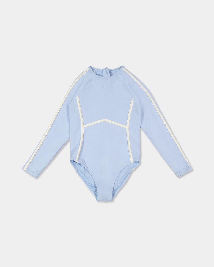 Image of a model wearing Tops. Product name - Roxy Girls 8-16 Kauai Long Sleeve One Piece Swimsuit Windsurfer in Windsurfer colour by brand - Roxy