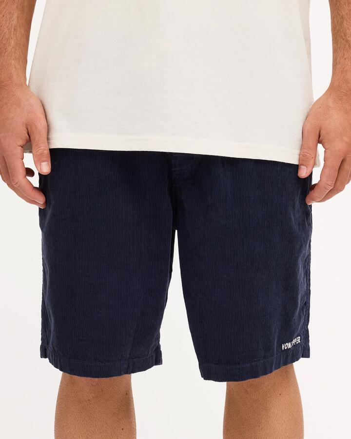 Image of a model wearing Shorts. Product name - Von Zipper Mens Byron Cord Walkshorts Navy in Navy colour by brand - Von Zipper