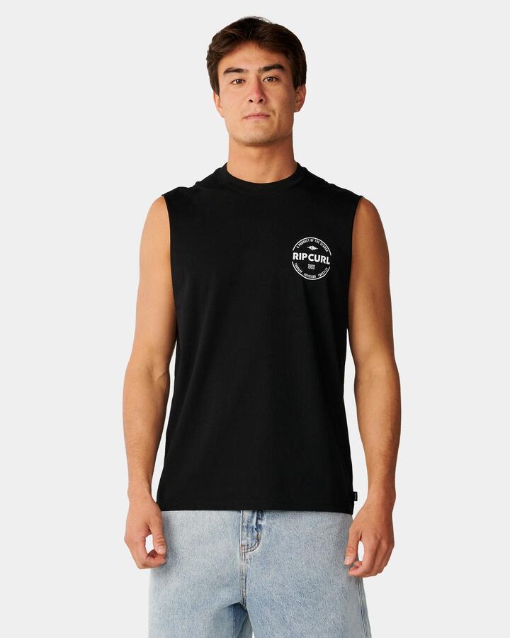 Image of a model wearing Tops. Product name - Rip Curl Mens Staple Muscle Black in Black colour by brand - Rip Curl