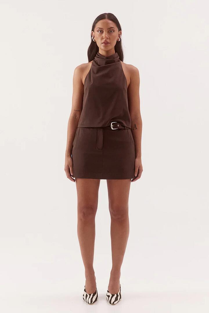 Image of a model wearing Skirts. Product name - Amorey Espresso Mini Skort in Brown colour by brand - Sovere