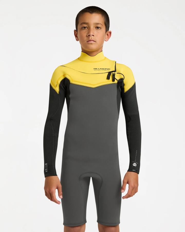 Image of a model wearing Tops. Product name - Billabong Boys 8-16 2/2 Absolute Ultra Long Sleeve Chest Zip Springsuit Orange in Orange colour by brand - Billabong