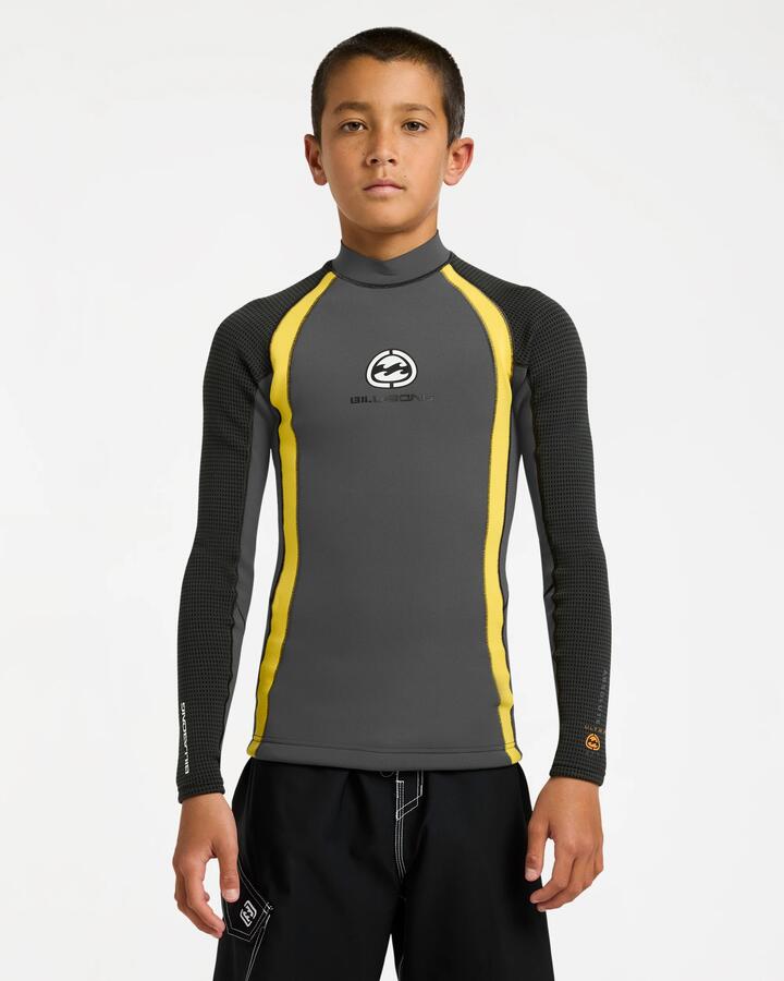 Image of a model wearing Tops. Product name - Billabong Boys 8-16 1/1 Absolute Ultra Long Sleeve Jacket Wetsuit Top Orange in Orange colour by brand - Billabong