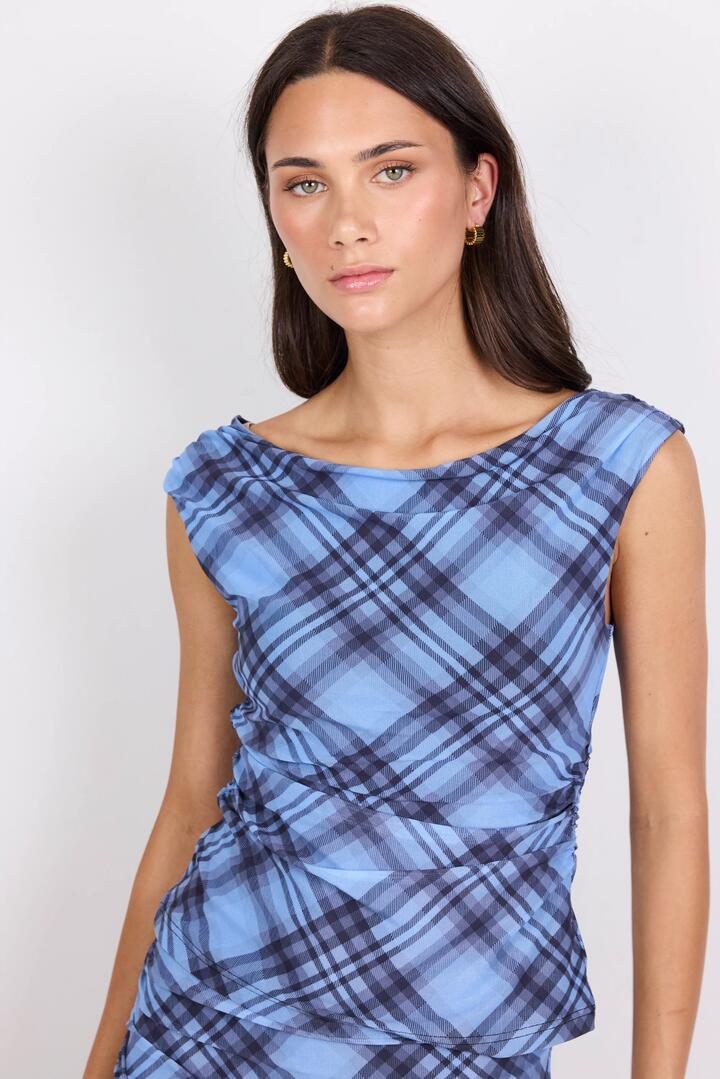 Image of a model wearing Tops. Product name - Ponder Blue Check Mesh Sleeveless Top in Blue Check colour by brand - Among the Brave