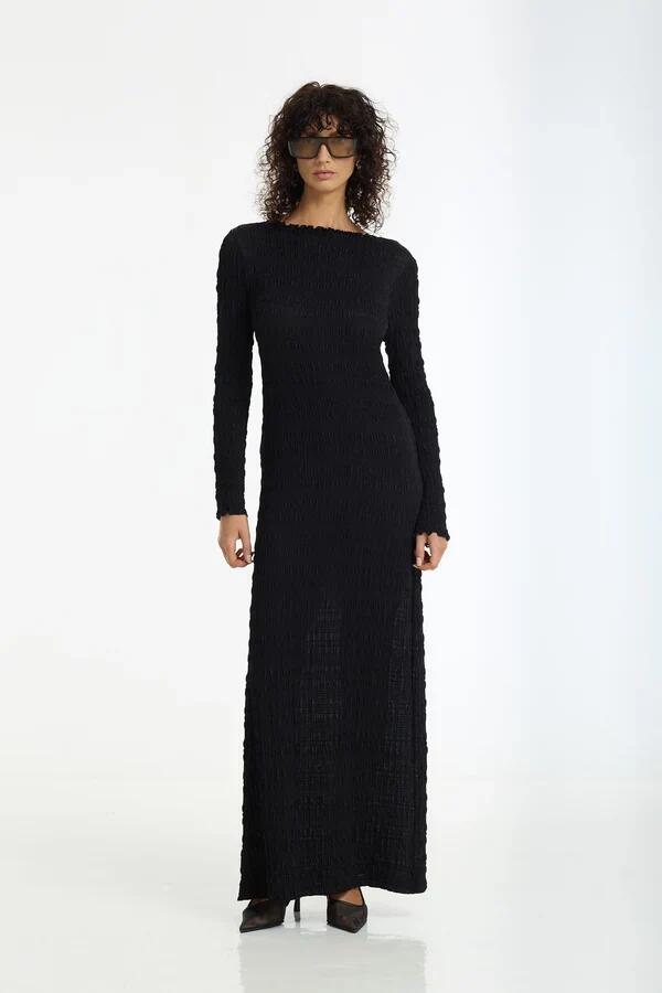Image of Dresses. Product name - Gigi Black Textured LS Maxi Dress in Black colour by brand - Blak