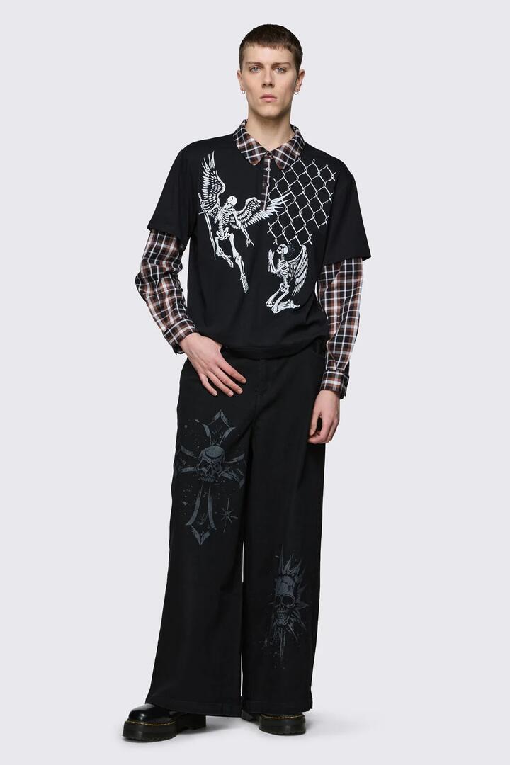 Image of a model wearing Tops. Product name - Archangel Polo Long Sleeve Top in Black/Brown colour by brand - Dangerfield