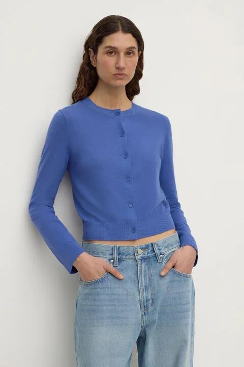 Image of a model wearing Outerwear. Product name - Orina New Blue Cotton Cashmere Cardigan in Blue colour by brand - Assembly Label