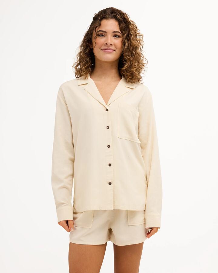 Image of a model wearing Tops. Product name - Quiksilver Womens Long Sleeve Shirt Sandshell in Sandshell colour by brand - Quiksilver