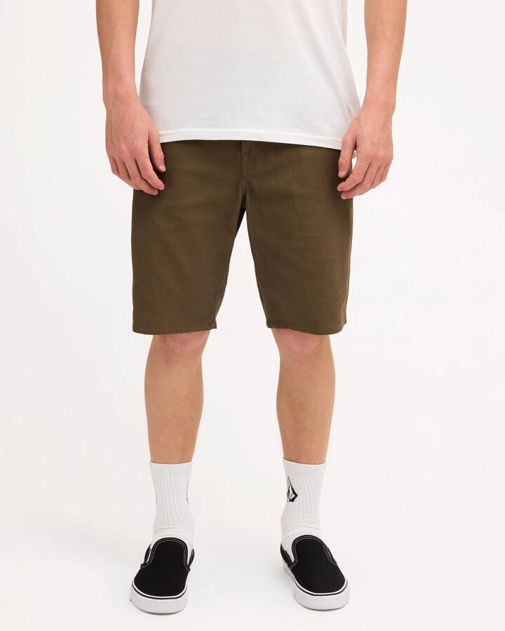 Image of a model wearing Shorts. Product name - Volcom Mens Modown Twill Shorts Wintermoss in Wintermoss colour by brand - Volcom
