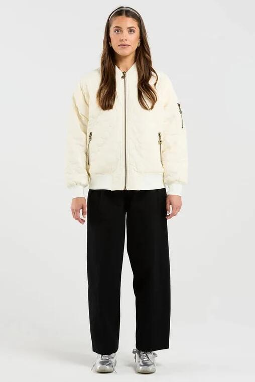 Image of Coats & Jackets. Product name - Flying Milk Quilted Bomber Jacket in Black colour by brand - Thing Thing