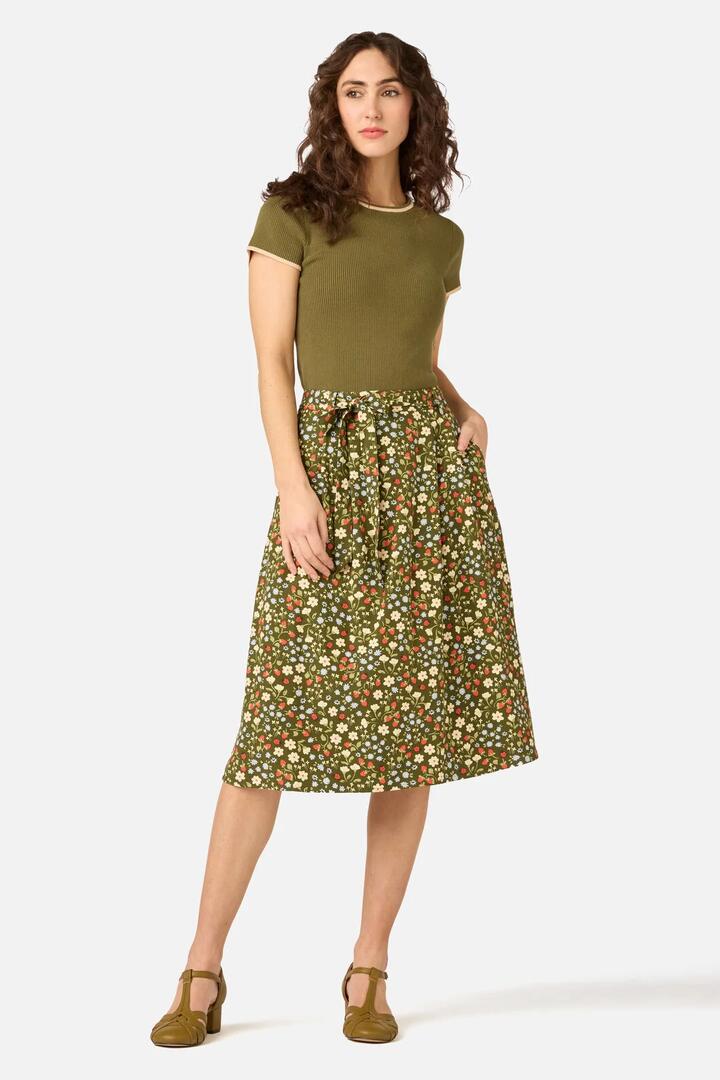 Image of a model wearing Skirts. Product name - Ditsy Ladybug Midi Skirt in Green colour by brand - Princess Highway