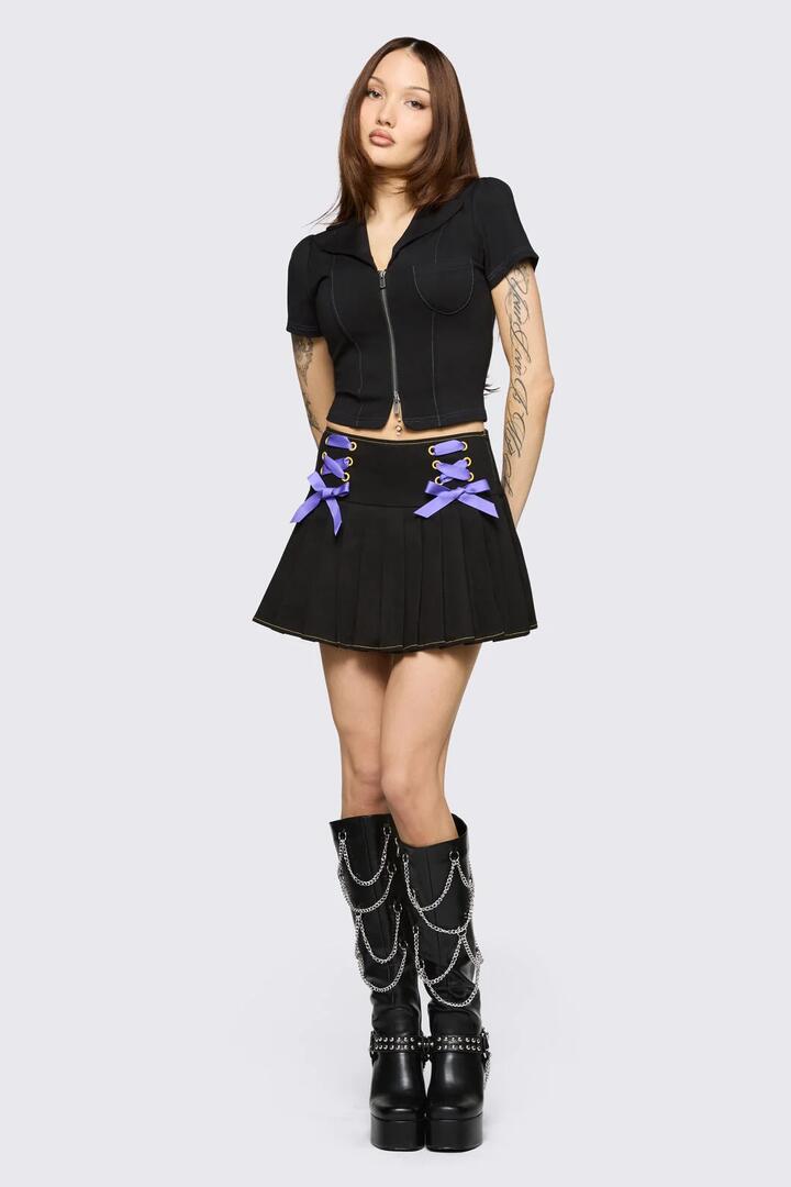 Image of a model wearing Skirts. Product name - Hot Issue Skort in Black colour by brand - Black Friday