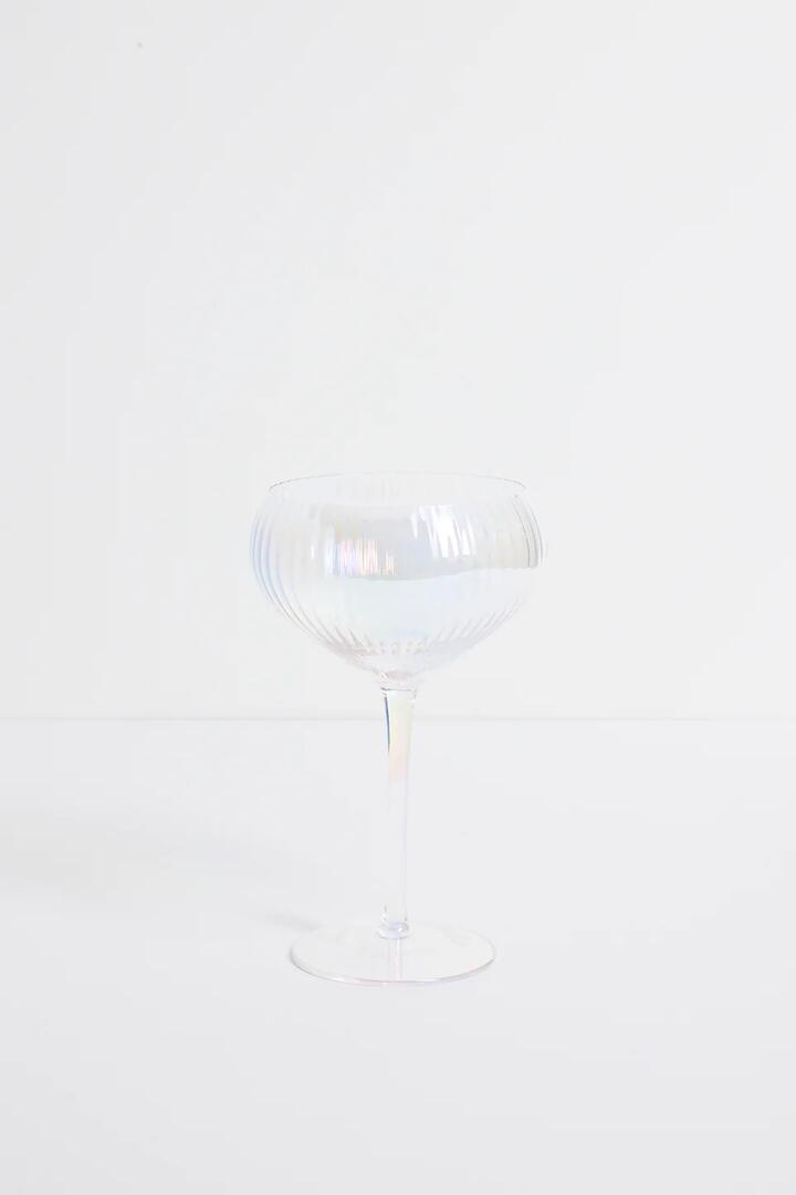 Image of Kitchen & Dining. Product name - Iridescent Ripple Wide Champagne Wine Glass in Champagne colour by brand - Willow & Mae