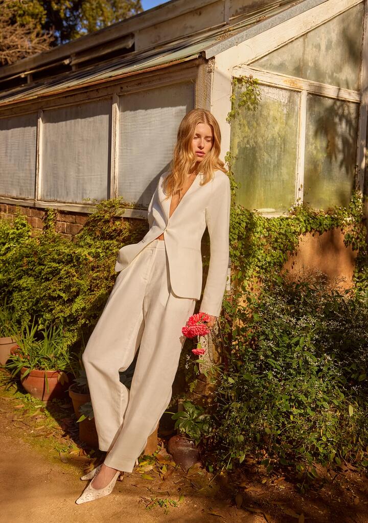 Image of a model wearing Pants. Productname: Cecilia Barrel Leg Pants in Off White colour by brand - MOS The Label