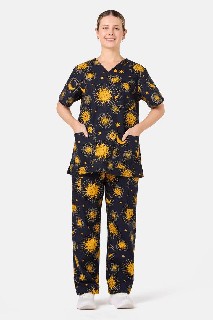 Image of a model wearing Uniforms & Workwear. Product name - Ethereal Sky Scrub Set in Navy colour by brand - Scrubs With Love