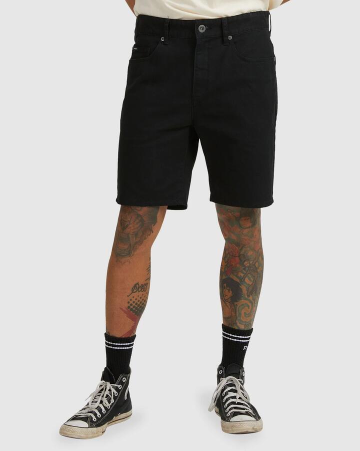 Image of a model wearing Shorts. Product name - RVCA Mens Daggers Twill Walkshorts Black in Black colour by brand - RVCA