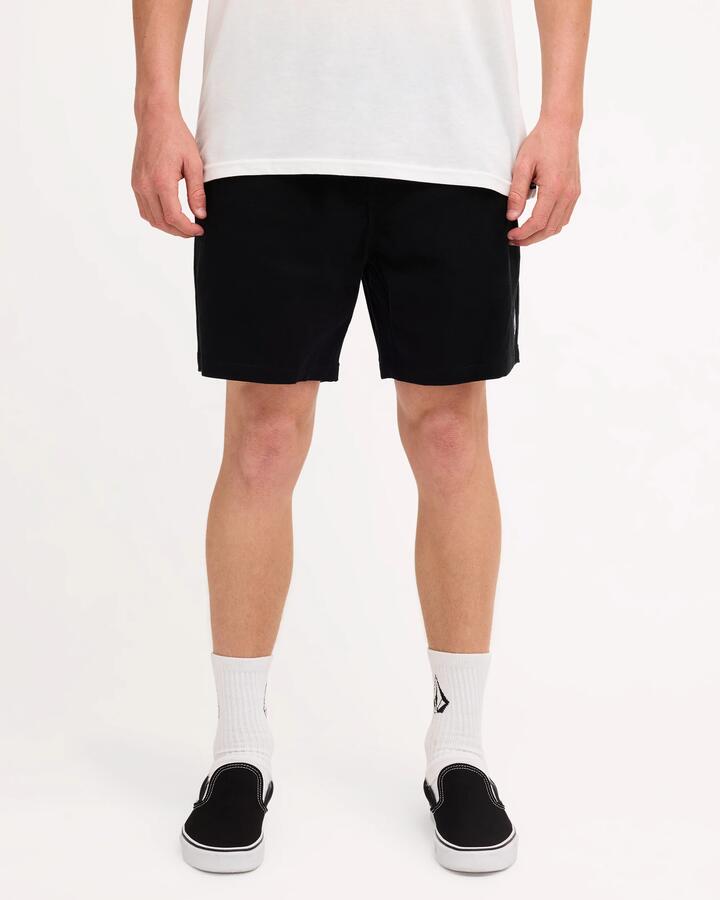 Image of a model wearing Shorts. Product name - Volcom Mens Lethal Stone Elastic Shorts Black in Black colour by brand - Volcom