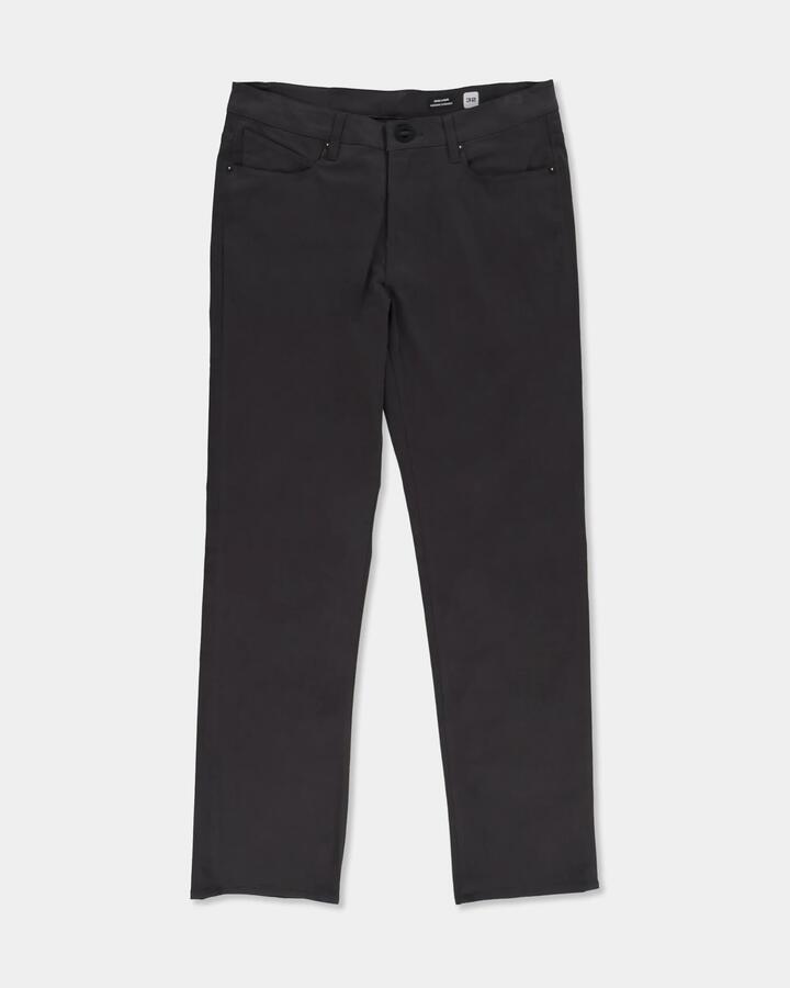 Image of a model wearing Pants. Product name - Volcom Mens V Solver Twill Pants Stealth in Stealth colour by brand - Volcom