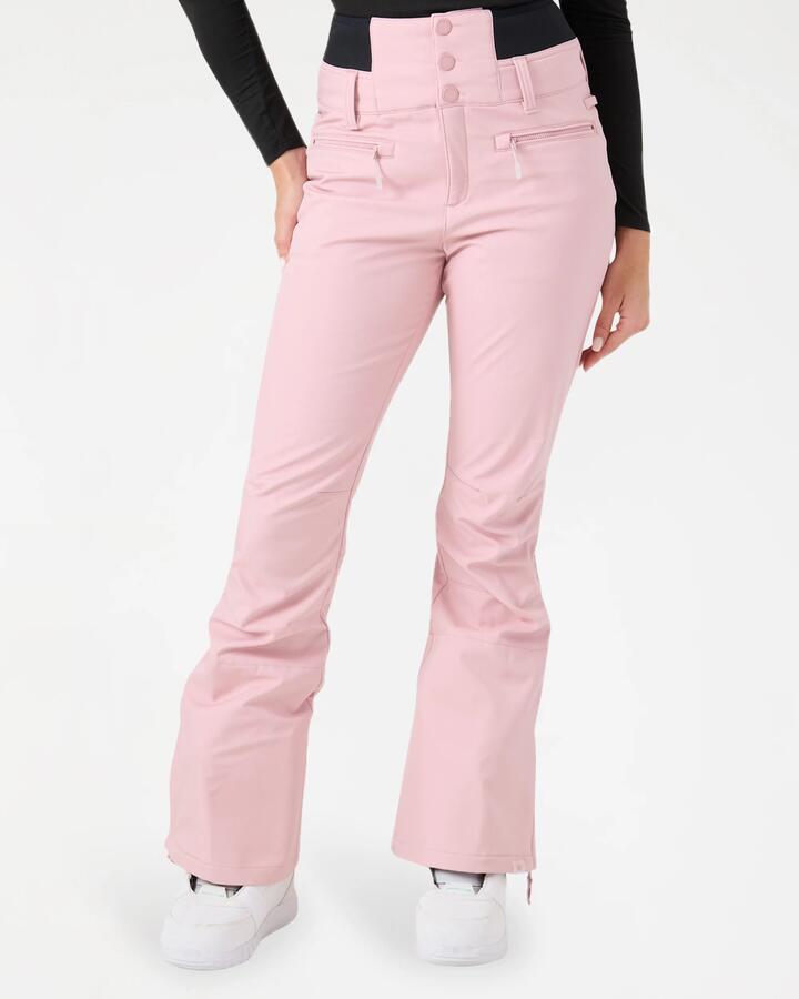 Image of a model wearing Pants. Product name - Roxy Womens Rising High Snow Pants Zephyr Pink in Zephyr Pink colour by brand - Roxy