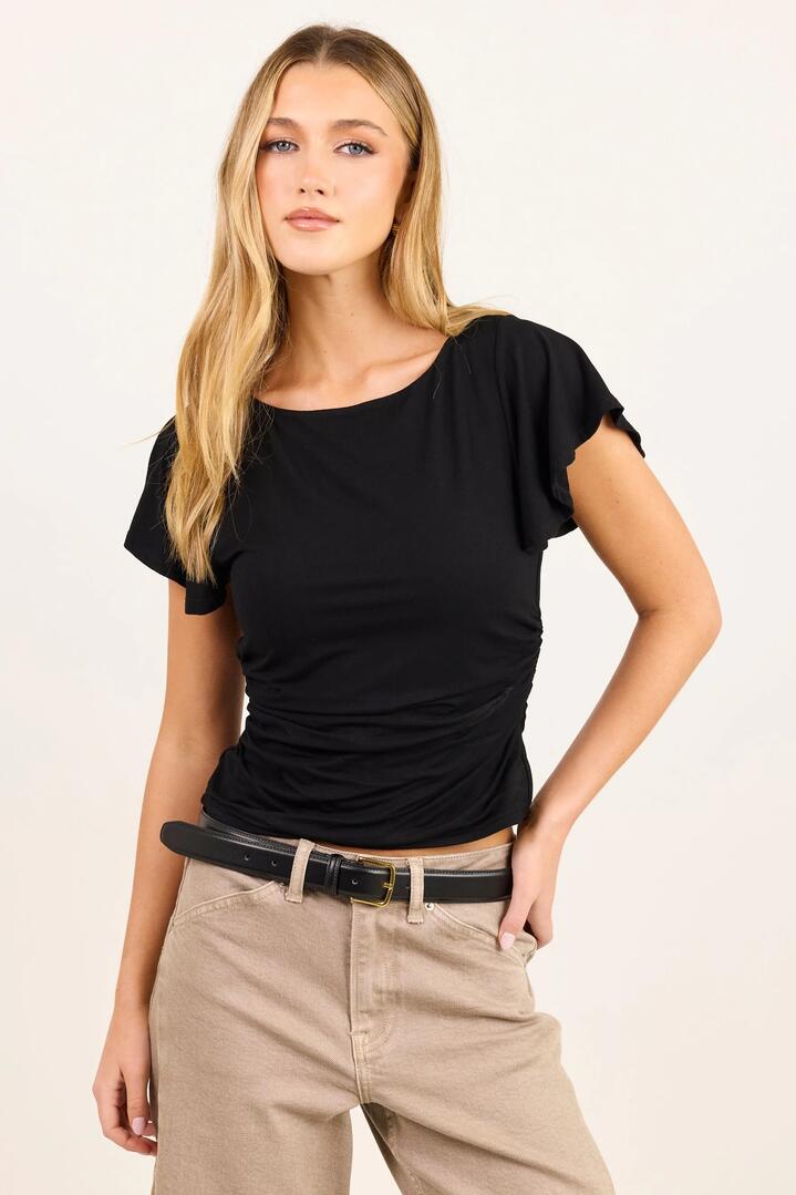 Image of a model wearing Tops. Product name - Flitter Black Gathered Waist Detail Short Sleeve Top in Black colour by brand - Stories be Told