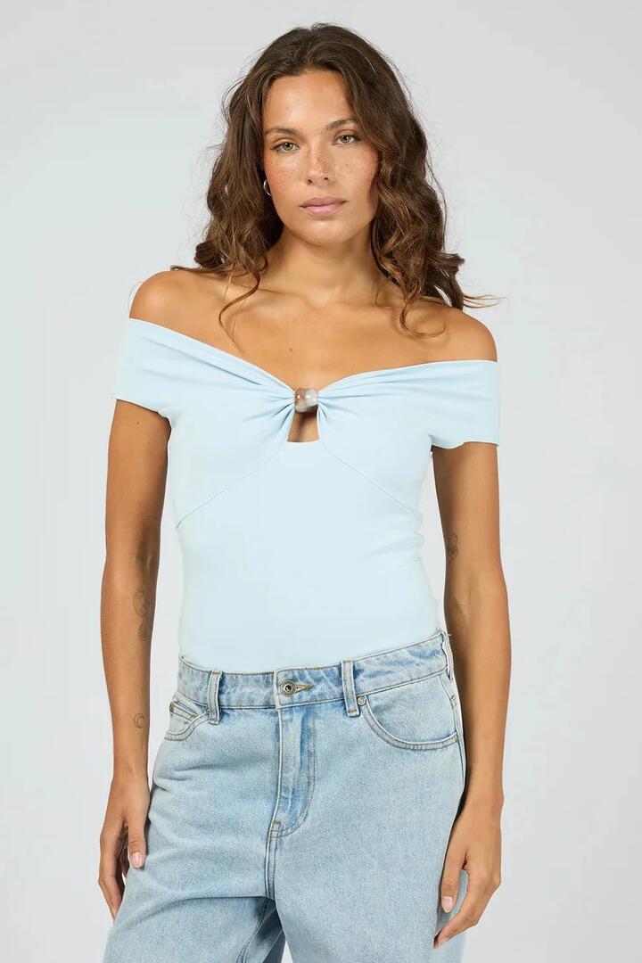 Image of a model wearing Tops. Product name - Atlas Ice Blue Off Shoulder Feature Bead Top in Blue colour by brand - Silent Theory