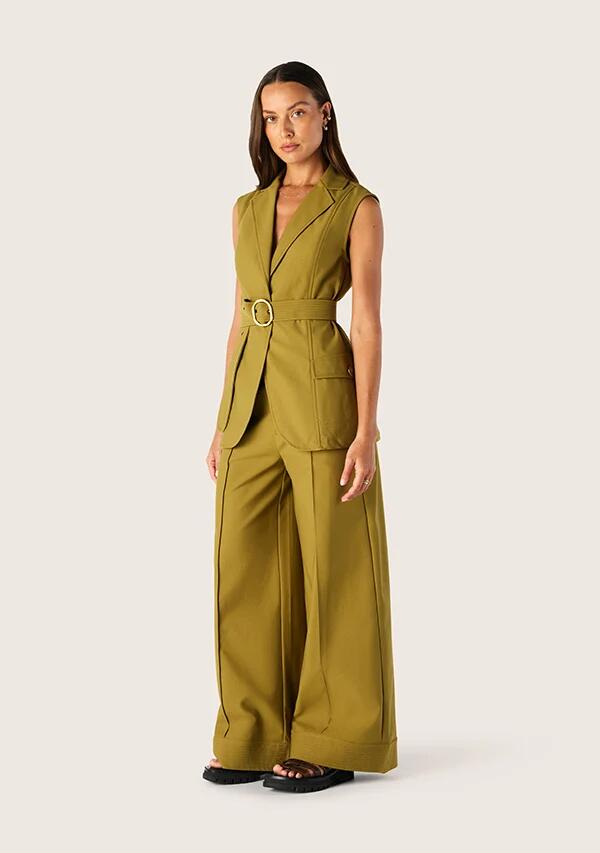 Image of a model wearing Pants. Productname: Carmelita Pants | MOS The Label in Moss colour by brand - MOS The Label