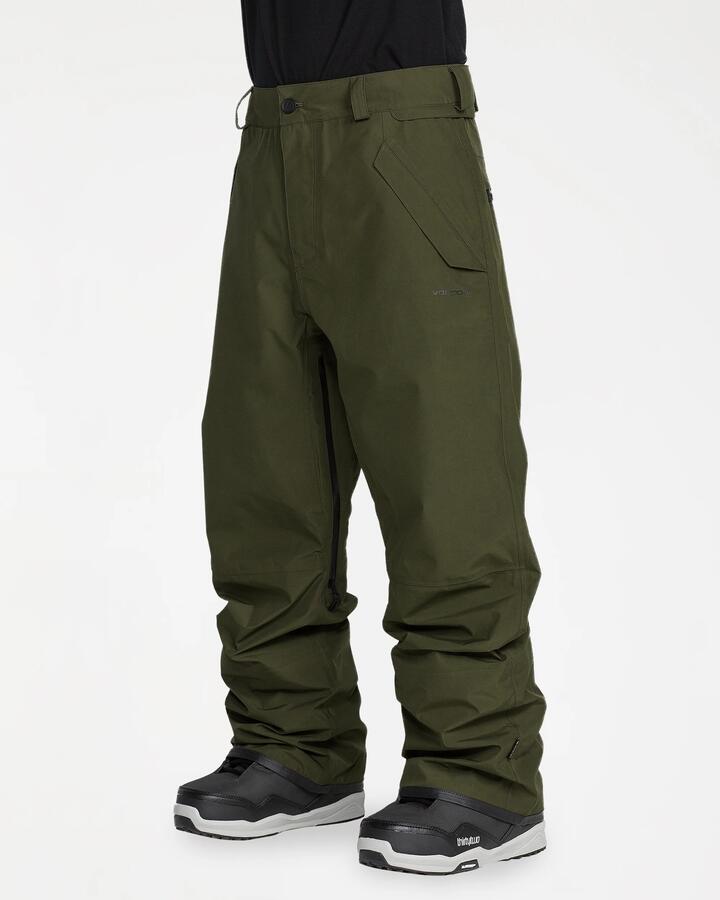 Image of a model wearing Pants. Product name - Volcom Mens Test Gore-Tex Pants Dark Green in Dark Green colour by brand - Volcom