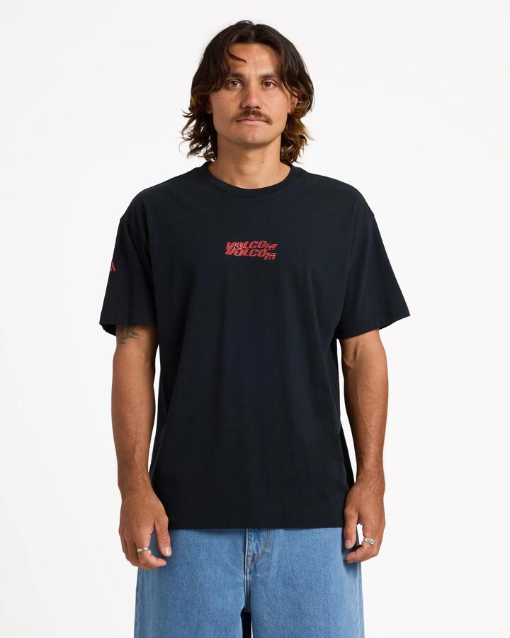 Image of a model wearing Tops. Product name - Volcom Mens Reaper Long Sleeve T-Shirt Black Out in Black Out colour by brand - Volcom