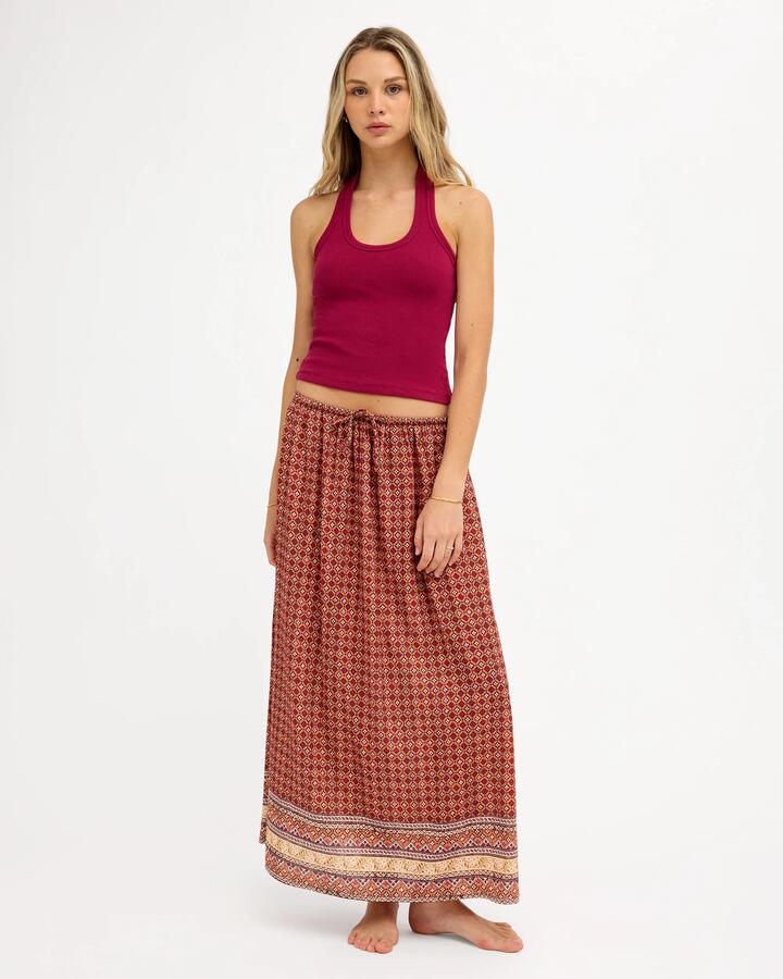 Image of a model wearing Skirts. Product name - Roxy Womens Aurora Maxi Skirt Dusty Orange in Dusty Orange colour by brand - Roxy