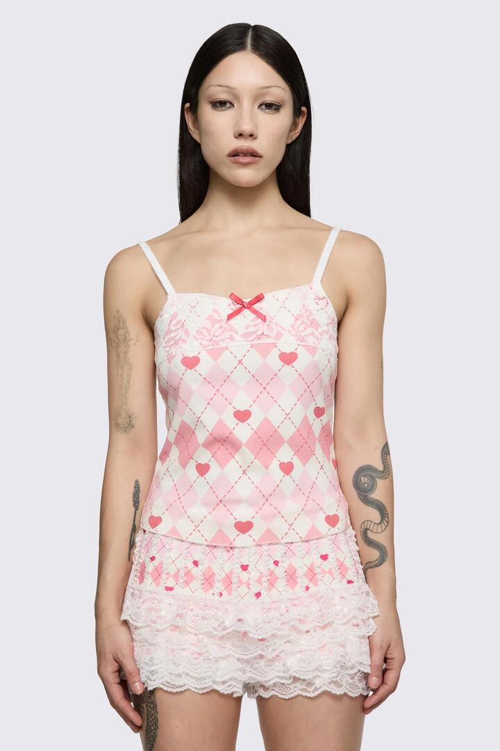 Image of a model wearing Tops. Product name - Broken Rollercoaster Lacey Tank in Pink/Cream colour by brand - Dangerfield
