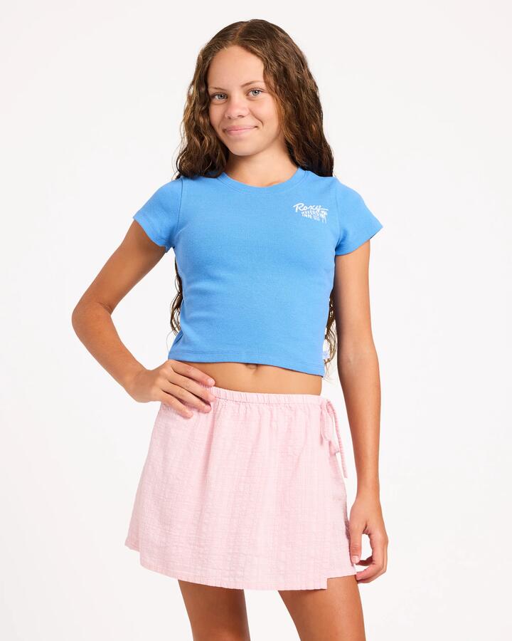 Image of a model wearing Skirts. Product name - Roxy Girls 8-16 Aloha Blush Skort Powder Pink in Powder Pink colour by brand - Roxy