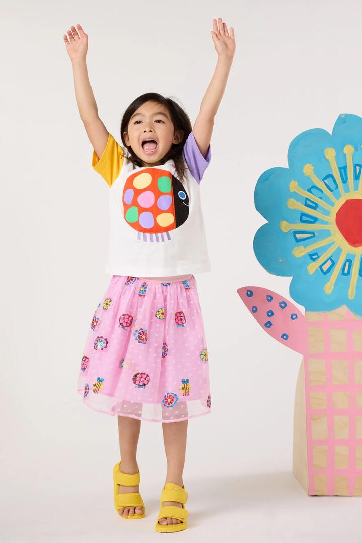 Image of a model wearing Skirts. Product name - Lady And The Bee Kids Sequins Skirt in Pink colour by brand - Gorman