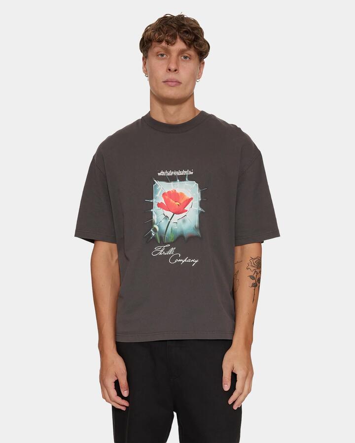 Image of a model wearing Tops. Product name - Thrills Together Together Oversize Box Crop Pk26 Pirate Black in Pirate Black colour by brand - Thrills