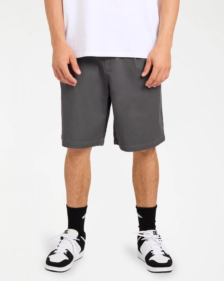 Image of a model wearing Shorts. Product name - Quiksilver Mens Momentum 22" Walkshorts Iron Gate in Iron Gate colour by brand - Quiksilver