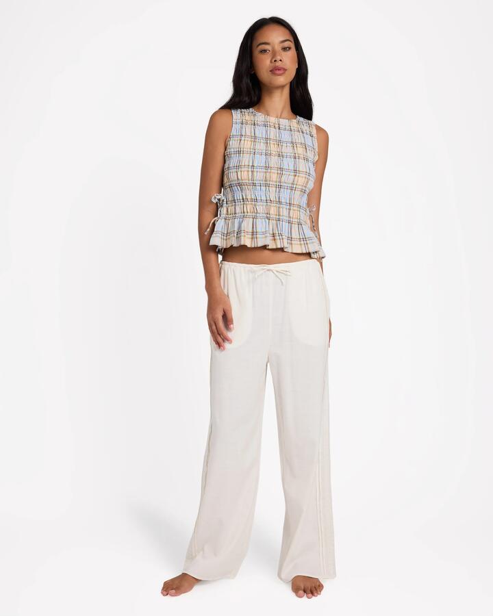 Image of a model wearing Pants. Product name - Billabong Womens Stay Dreaming Pants Salt Crystal 1 in Salt Crystal 1 colour by brand - Billabong