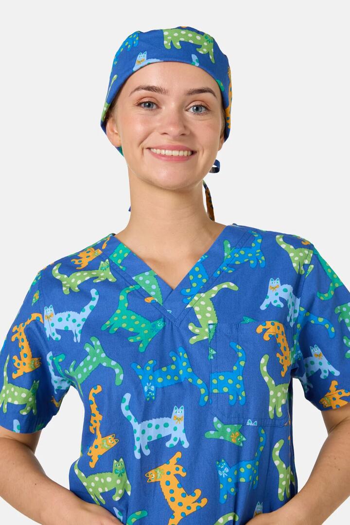 Image of a model wearing Uniforms & Workwear. Product name - Spotty Cats Scrub Hat in Navy colour by brand - Gorman