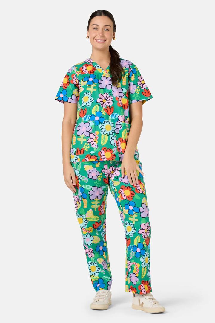 Image of a model wearing Uniforms & Workwear. Product name - Floral Pop Scrub Set in Green colour by brand - Gorman