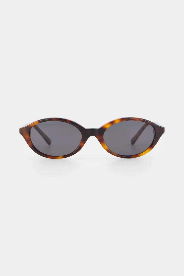 Image of Sunglasses. Product name - Mirabel Tort Narrow Oval Sunglasses in colour by brand - Isle of Eden