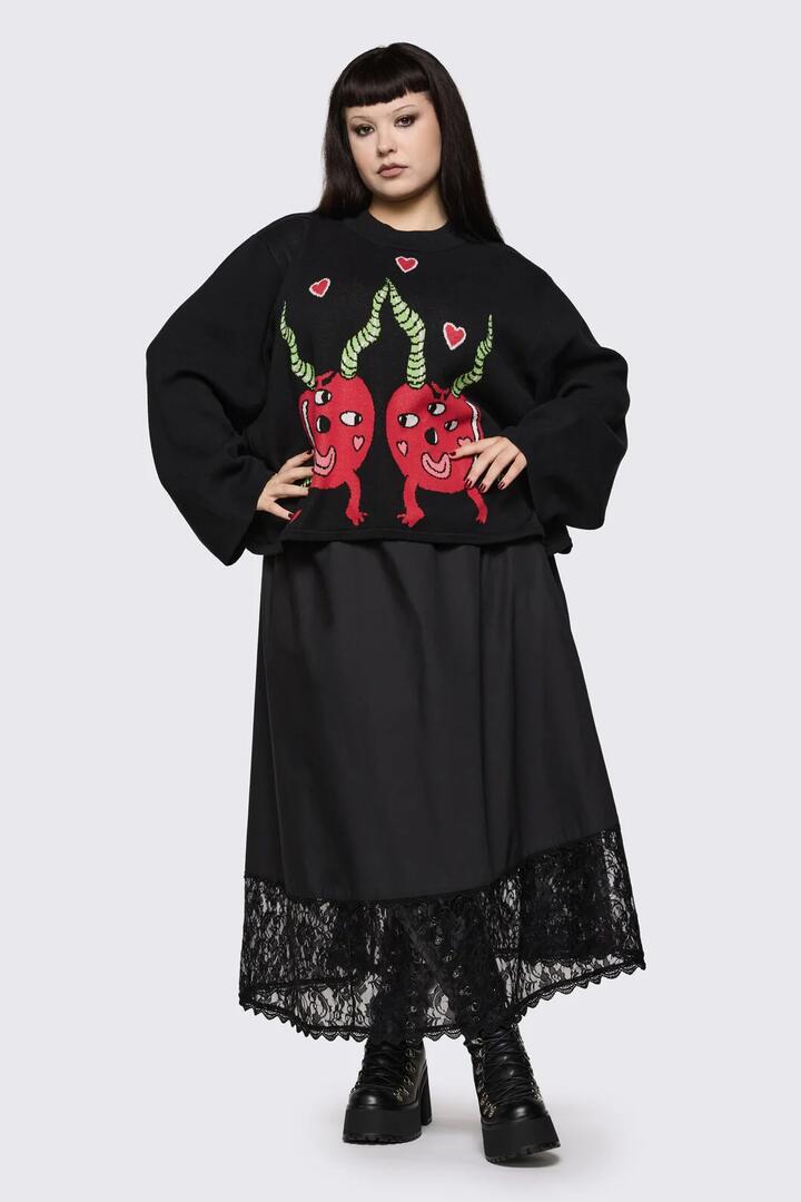 Image of a model wearing Tops. Product name - Curve Cherry Poppin' Skivvy in Black colour by brand - Black Friday