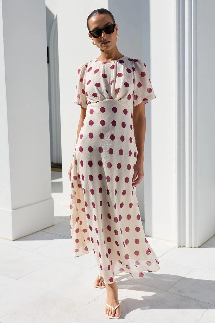 Image of Dresses. Product name - Centrestage Cream Wine Polka Dot Twist Front SS Maxi Dress in Cream Wine Polka Dot colour by brand - Stories be Told